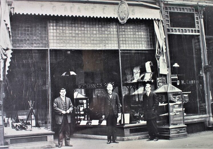Adams Store early front with staff.2